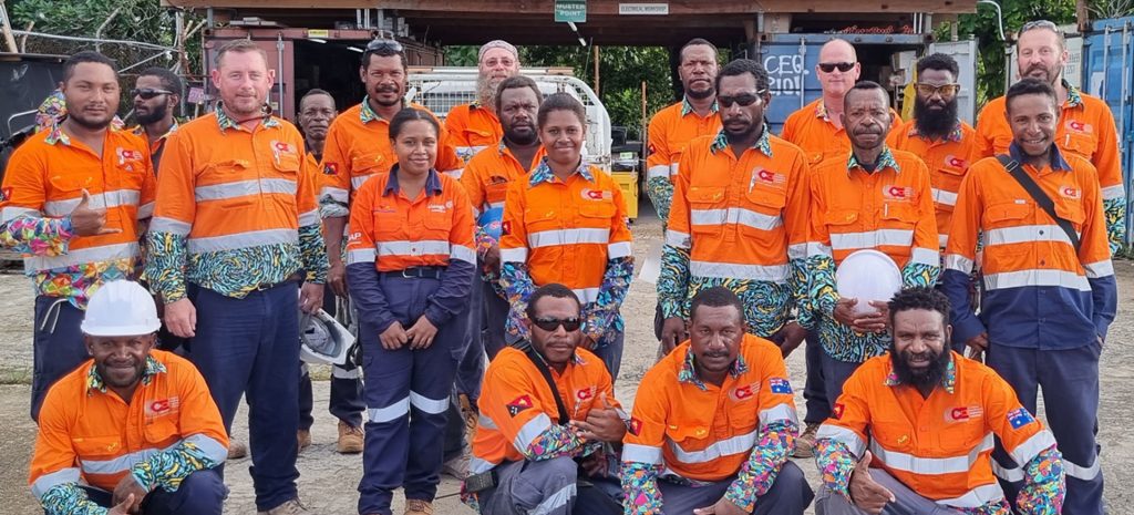 CE Group Electrical Contractor. Group of PNG nationals in CE Group Trademutt uniform